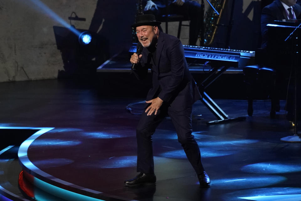 Ruben Blades performs "Pedro Navaja" at the Latin Recording Academy Person of the Year gala in his honor at the Mandalay Bay on Wednesday, Nov. 17, 2021, in Las Vegas. (AP Photo/Chris Pizzello)