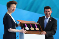 LONDON, ENGLAND - JULY 27: Princess Anne, Princess Royal and LOCOG Chairman Sebastian Coe present the Olympic medals during the' London 2012 - One Year To Go' ceremony in Trafalgar Square on July 27, 2011 in London, England. The one year countdown to the London 2012 Olympic games was marked with a unique ceremony in Trafalgar Square, with IOC President Jacques Rogge inviting the world's athletes to compete in next summer's games. (Photo by Clive Mason/Getty Images)