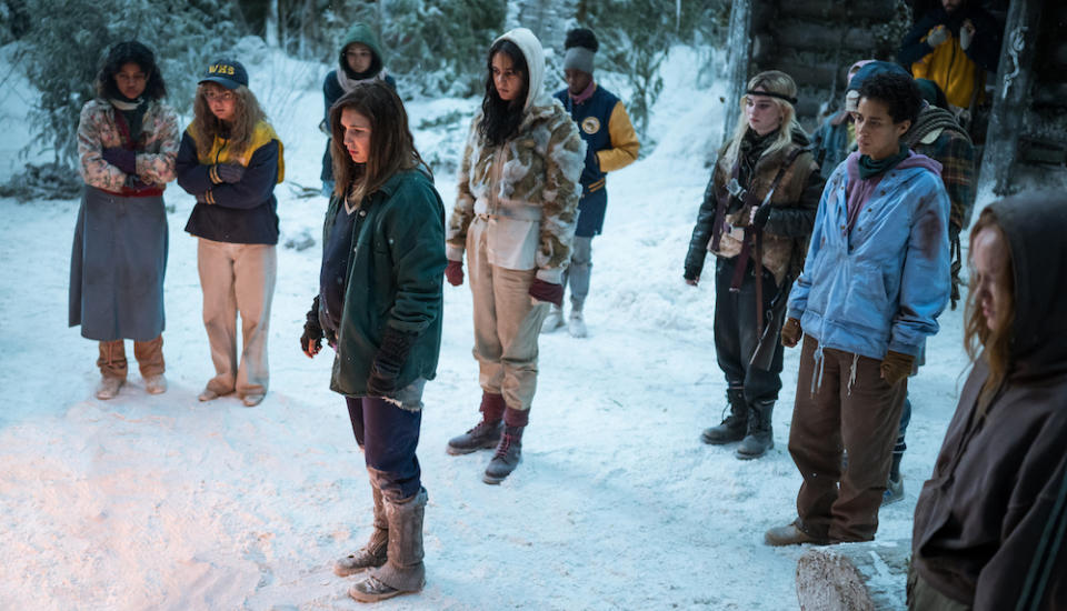 (L-R): Nuha Jes Izman as Teen Crystal, Samantha Hanratty as Teen Misty, Alexa Barajas as Teen Mari, Sophie Nélisse as Teen Shauna, Courtney Eaton as Teen Lottie, Nia Sondaya as Teen Akilah, Sophie Thatcher as Teen Natalie, Jasmin Savoy Brown as Teen Taissa, Steven Krueger as Ben Scott and Liv Hewson as Teen Van in YELLOWJACKETS, Season 2. Photo Credit: Kailey Schwerman/SHOWTIME.