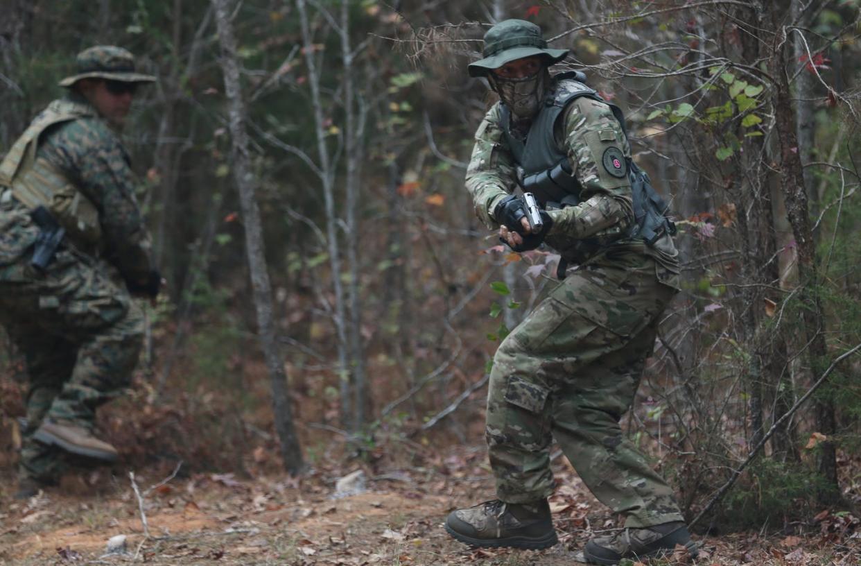 <span class="caption">Militia members associated with the Three Percenters movement conducting a military drill in Flovilla, Ga., in 2016, days after Trump's election. After his 2020 defeat, Three Percenters were involved in the Jan. 6, 2021 insurrection at the U.S. Capitol.</span> <span class="attribution"><a class="link " href="https://www.gettyimages.com/detail/news-photo/members-of-the-georgia-security-forces-are-seen-during-news-photo/623578082?adppopup=true" rel="nofollow noopener" target="_blank" data-ylk="slk:Mohammed Elshamy/Anadolu Agency/Getty Image;elm:context_link;itc:0;sec:content-canvas">Mohammed Elshamy/Anadolu Agency/Getty Image</a></span>