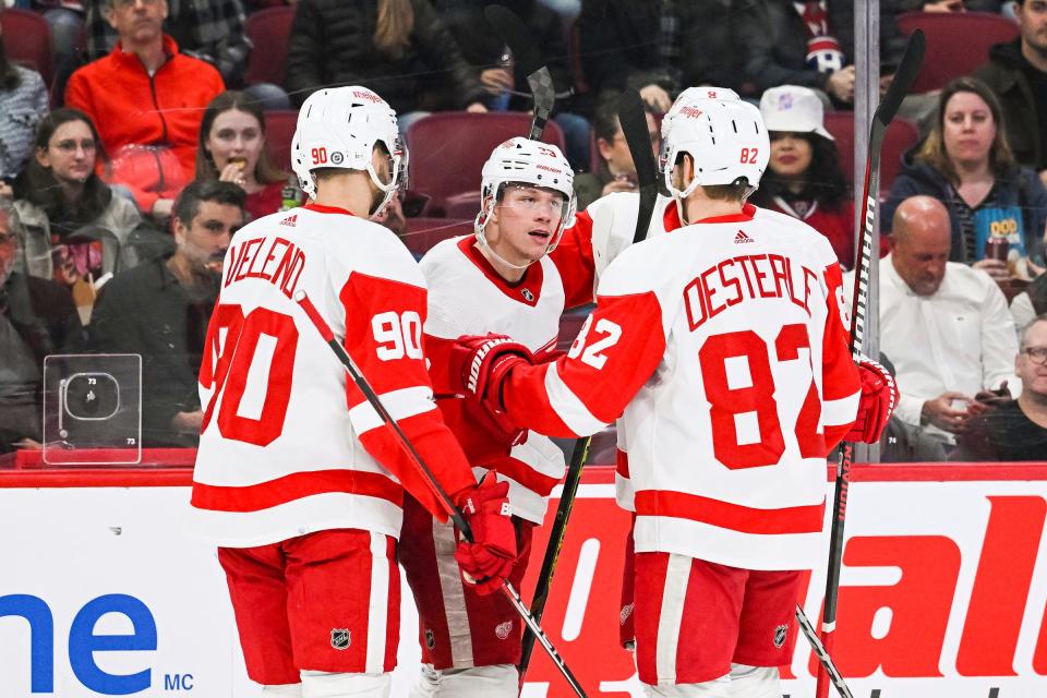 Red Wings left wing Lucas Raymond, center, celebrates his goal against the Canadiens with his teammates during the first period on Tuesday, April 4, 2023, in Montreal.