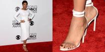 <p> The singer walked the 2014 People&apos;s Choice Award red carpet in a pair of strappy sandal heels that were noticeably crushing her pinky toes. And it looks like there is barely any sole to support her feet. Yikes! </p>