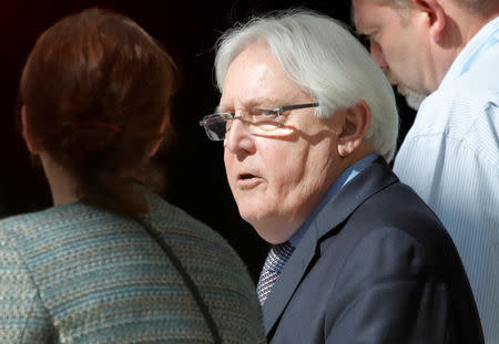 United Nations envoy Martin Griffiths walks in a hotel lobby before meeting the delegation of the Government of Yemen in Geneva, Switzerland September 7, 2018. Picture taken through a window. REUTERS/Denis Balibouse