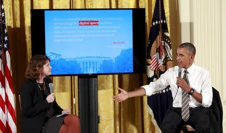 U.S. President Barack Obama takes part in a conversation co-hosted by Coworker.org following a worker summit at the White House in Washington October 7, 2015. REUTERS/Kevin Lamarque