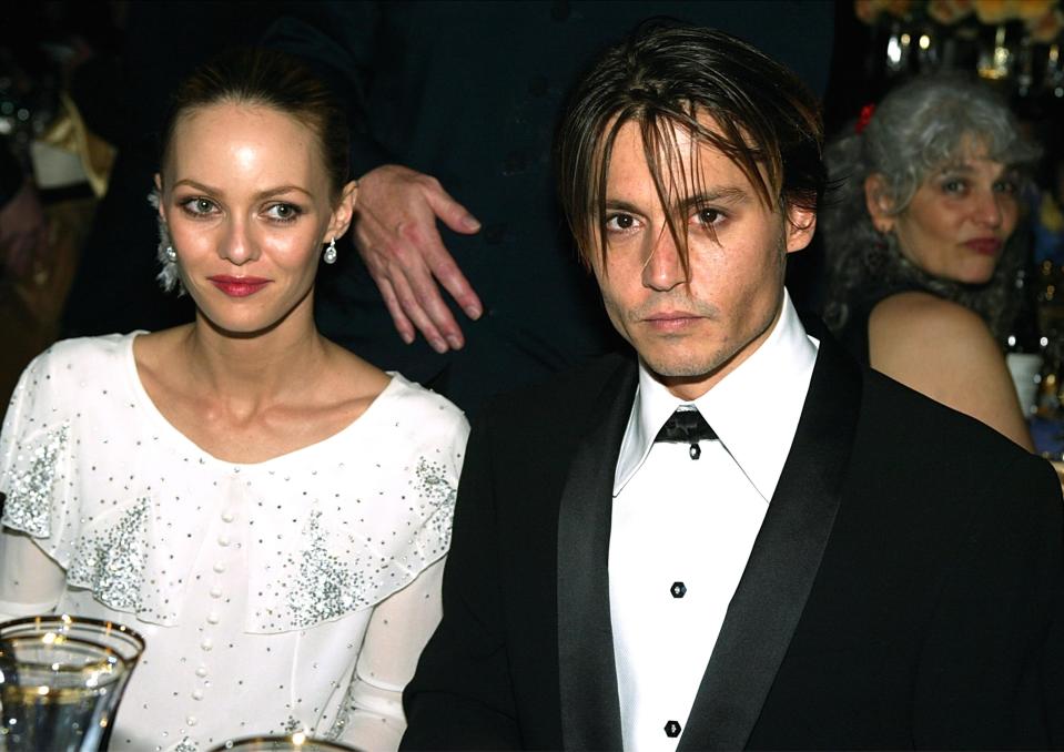 Actor Johnny Depp and his partner Vanessa Paradis pose at the The Governors Ball in 2004