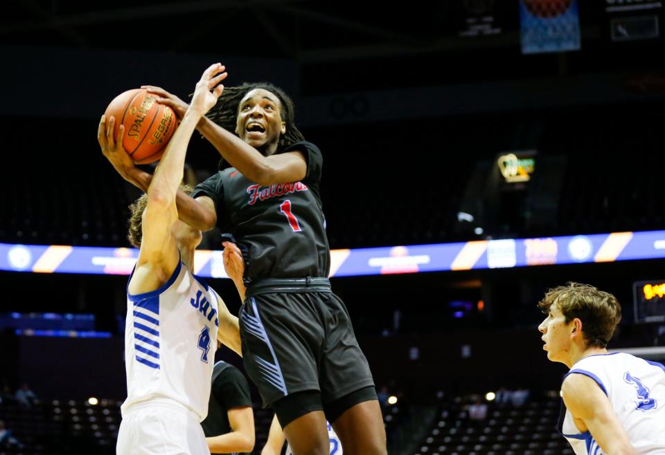 Glendale's Ta'Veaion Washington looks to the basket as the Falcons took on the Marshfield Bluejays in the first round of the Gold Division during the Blue and Gold Tournament at Great Southern Bank Arena on Tuesday, Dec. 26, 2023.