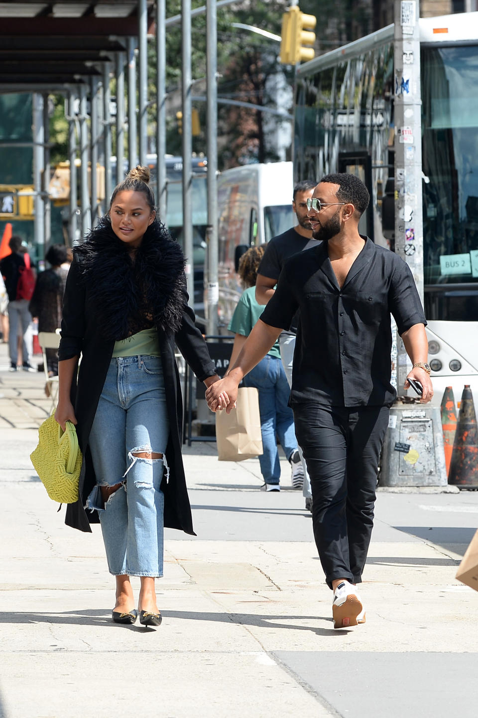 Chrissy Teigen and John Legend walk to a lunch date in New York City. - Credit: Elder Ordonez / SplashNews.com