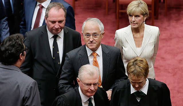 Malcom Turnbull, flanked by Nationals leader Barnaby Joyce and deputy Liberal leader Julie Bishop. Source: Getty