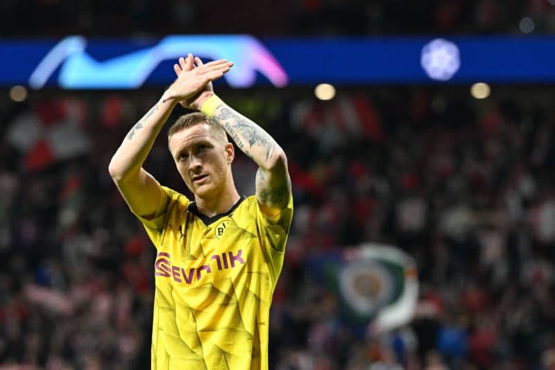 Dortmund's Marco Reus reacts after the UEFA Champions League, knockout round, quarter-finals, first leg soccer match between Atletico Madrid and Borussia Dortmund at Wanda Metropolitano.  Long-serving Borussia Dortmund forward Marco Reus is to leave the club at the end of the season, ending "an extraordinary era," the Bundesliga team said on Friday. Federico Gambarini/dpa