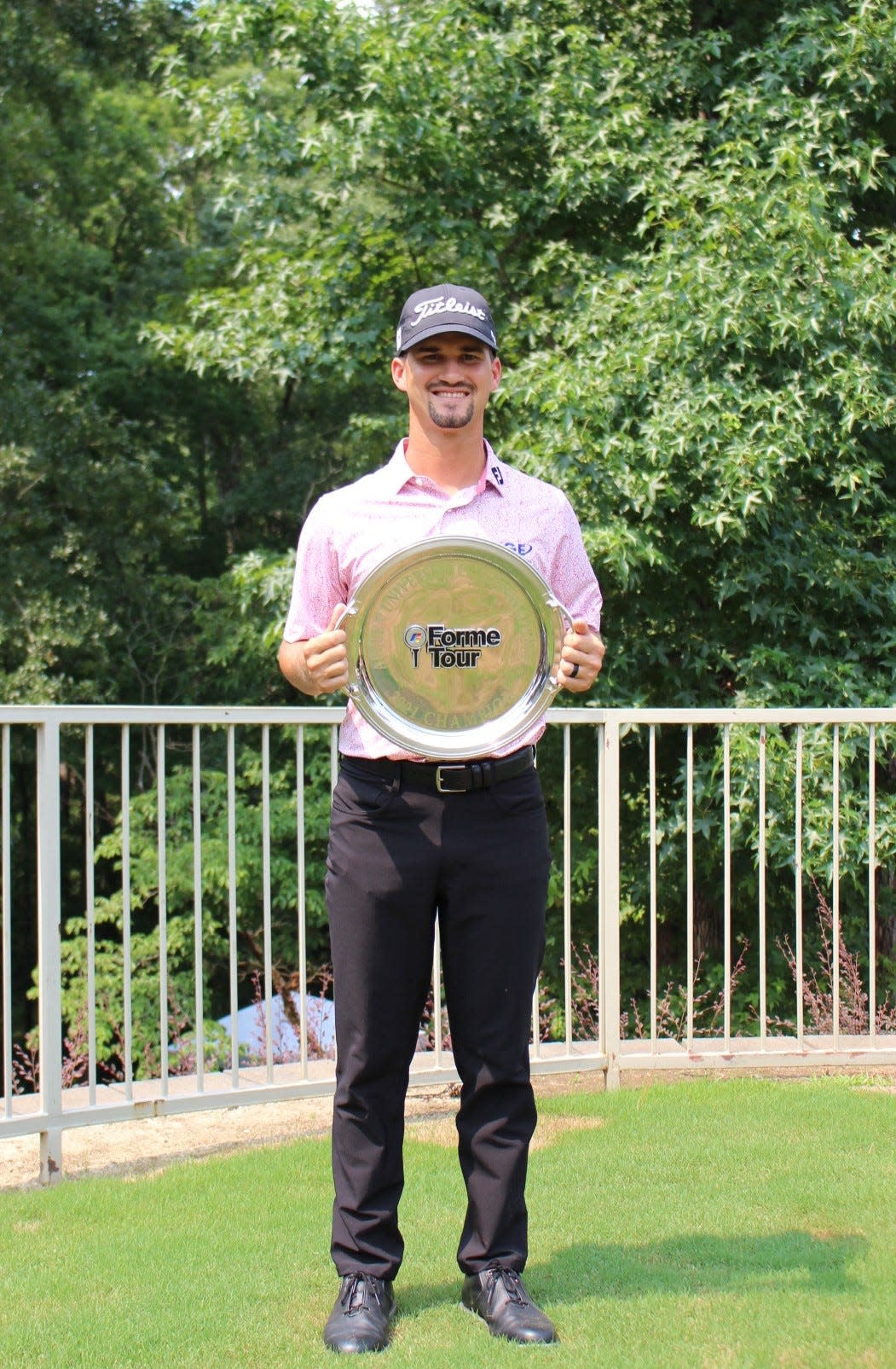 UNF graduate Phillip Knowles, showing his plague for winning a Forme Tour event last year, has a second chance to get his PGA Tour card.