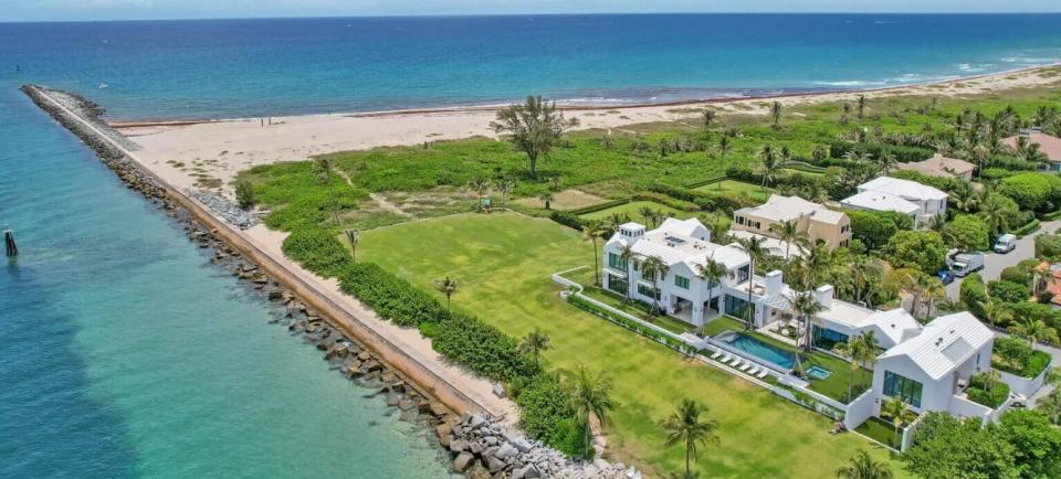 Seen in the foreground, the contemporary-style house at 149 E. Inlet Drive presides over 4 acres, including federally protected easements, and offers wide views of the Atlantic and the inlet on the north tip of Palm Beach. The house just sold for a recorded $68.146 million.