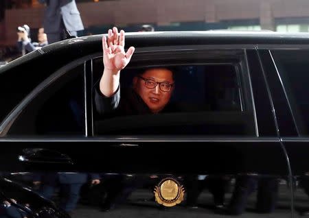 North Korean leader Kim Jong Un (inside a vehicle) bids farewell to South Korean President Moon Jae-in as he leaves after a farewell ceremony at the truce village of Panmunjom inside the demilitarized zone separating the two Koreas, South Korea, April 27, 2018. Korea Summit Press Pool/Pool via Reuters