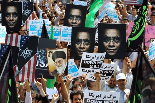 Iranian protestors demonstrate against a film mocking Islam in Tehran on September 14, 2012. Iran announced it was yanking its entry in the Oscars race because of the "intolerable insult" of the US-made anti-Islam film that has angered Muslims in several countries