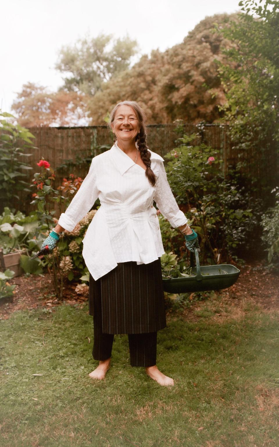 Suzanne Harding, Matthew Harding's mother, wears Palmer//Harding in her garden - Brendan Freeman