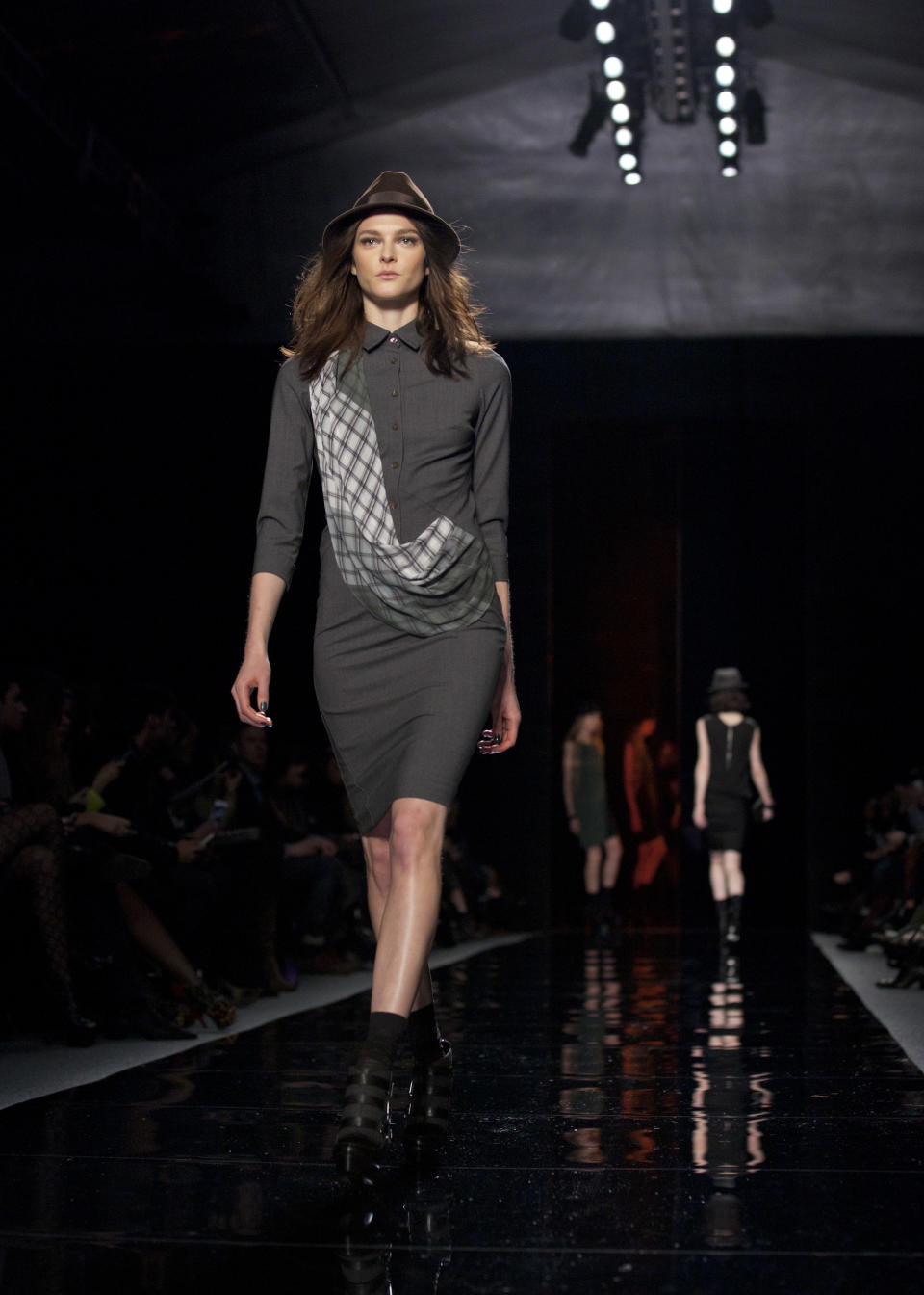 A model walks the runway during the Nicole Miller Fall 2013 fashion show during Fashion Week, Friday, Feb. 8, 2013, in New York. (AP Photo/Karly Domb Sadof)