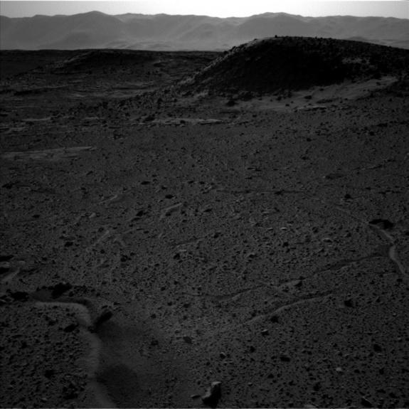 This image — captured by the left-side navigation camera on NASA's Mars Curiosity rover on April 3, 2014 — shows the same Martian locale where a bright flash seemed to appear that day in an image taken by the righthand navcam. Though the two na