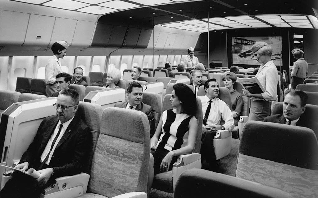 Smart dressing on an airplane - Bettmann Archive/Getty