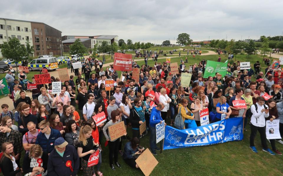 Protestors and supporters greet Theresa May and Jeremy Corbyn in York - Credit: Danny Lawson/PA