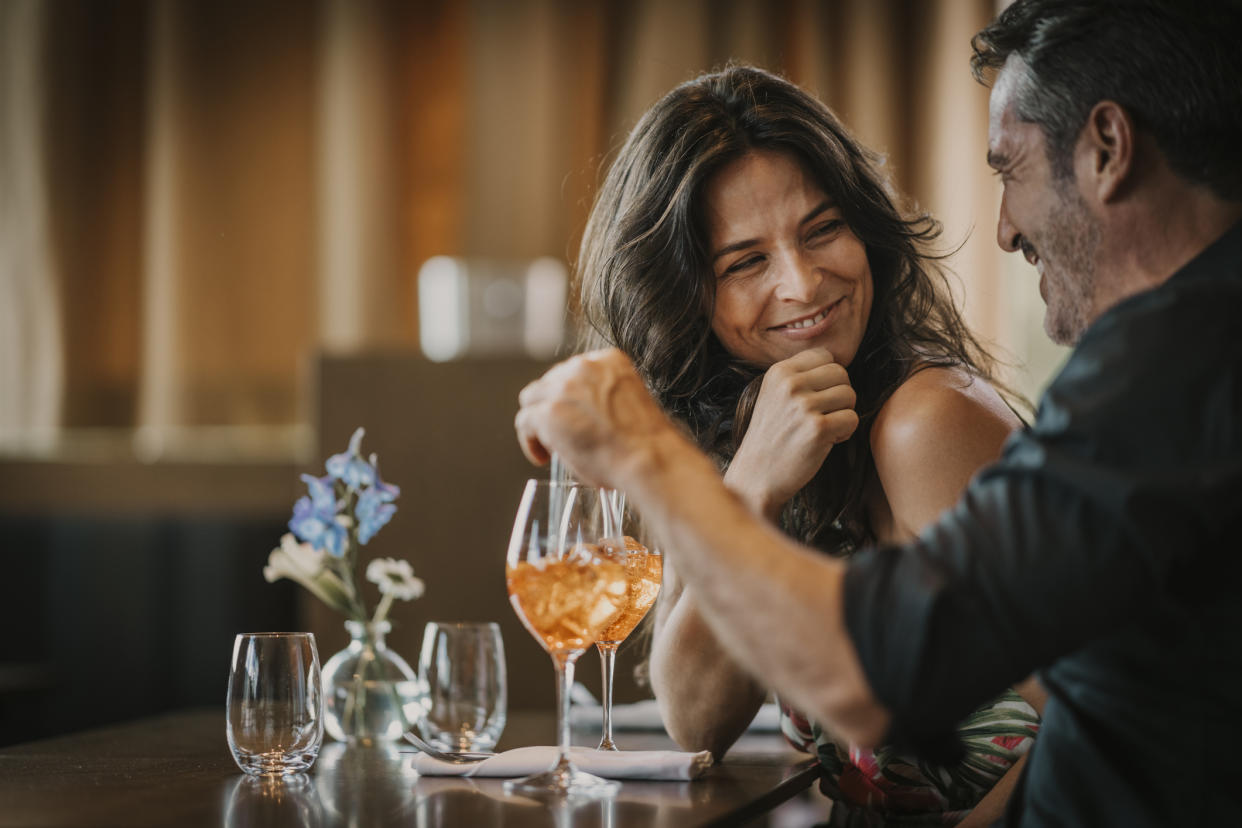 Couple on a dinner date. (Getty Images)