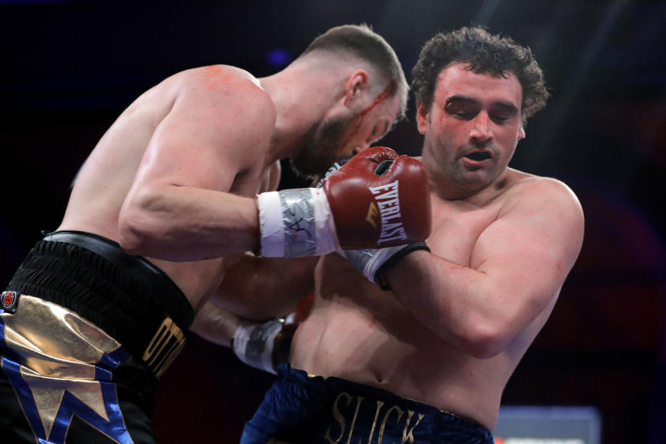 FILE - In this Saturday, April 13, 2019 file photo, Otto Wallin, left, fights Nick Kisner during the first round of a heavyweight boxing bout Saturday, April 13, 2019, in Atlantic City, N.J. Swedish heavyweight Otto Wallin will take his first step into big-time boxing when he fights Tyson Fury in Las Vegas on Saturday Sept. 14, 2019. A win for Wallin would be a big shock because the unbeaten Fury is the lineal champion and perhaps is the best heavyweight out there. (AP Photo/Julio Cortez, File)