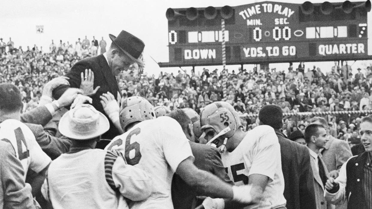 Notre Dame coach Terry Brennan celebrates with his team. (Bettmann Archives/Getty Images)