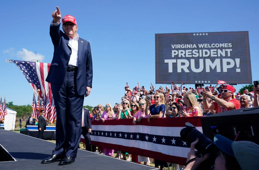 Republican presidential candidate former President Donald Trump waves to the crowd at a campaign rally in Chesapeake, Va., Friday June 28, 2024. (AP Photo/Steve Helber)