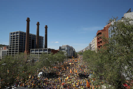 Pro-independence supporters march as they attend a demonstration in Barcelona, Spain, April 15, 2018. REUTERS/Albert Gea