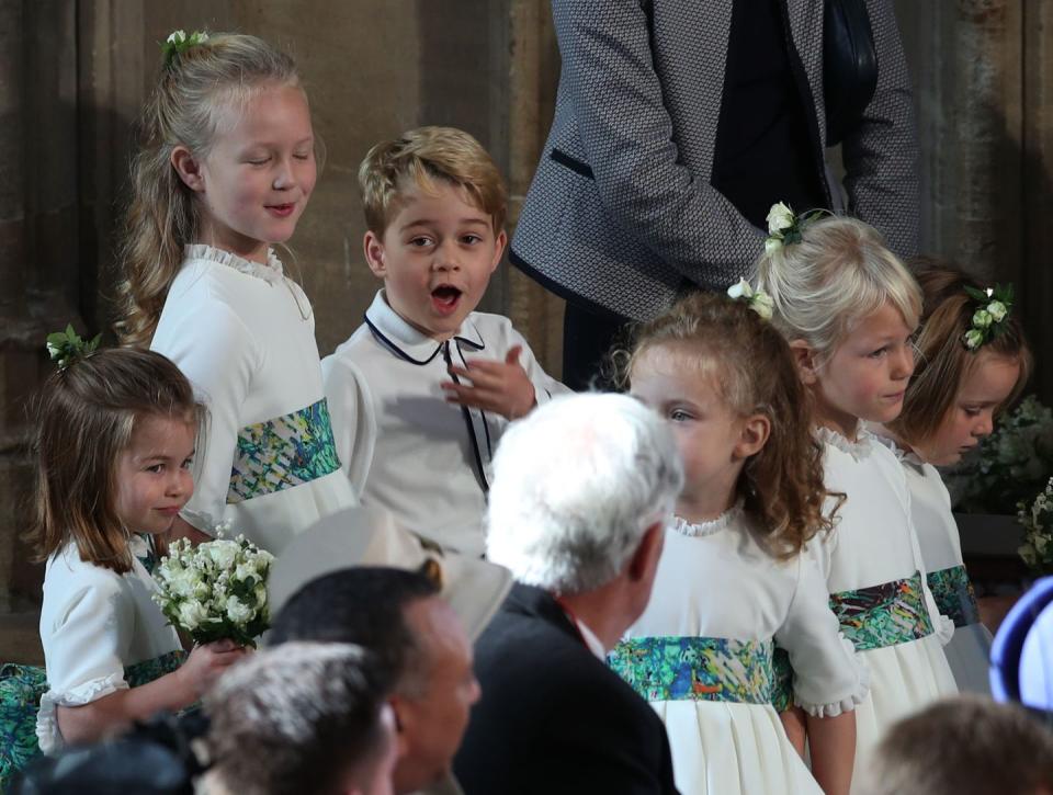<p>Per royal tradition, young family members play significant roles in weddings, which means if you’re old enough to walk, you’re old enough to be a bridesmaid or pageboy. Charlotte, Savannah, and George were definitely in on a secret joke while at <a href="https://www.cosmopolitan.com/entertainment/celebs/g23740861/princess-eugenie-wedding-secrets/" rel="nofollow noopener" target="_blank" data-ylk="slk:Princess Eugenie of York’s wedding;elm:context_link;itc:0;sec:content-canvas" class="link ">Princess Eugenie of York’s wedding</a> back in October 2018.</p>