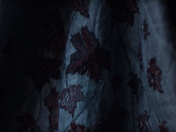 The interior of Sansa's sleeves are embellished with Weirwood leaves (HBO)