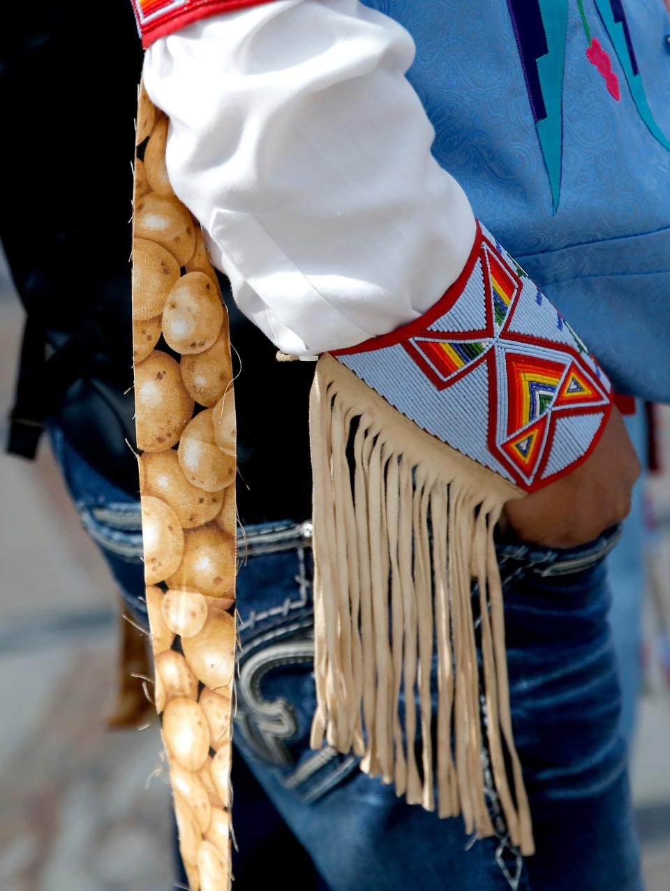 James Yellowfish waits to dance with his wife Jamie during the Potato Dance World Championships on Saturday at the First Americans Museum in Oklahoma City.
