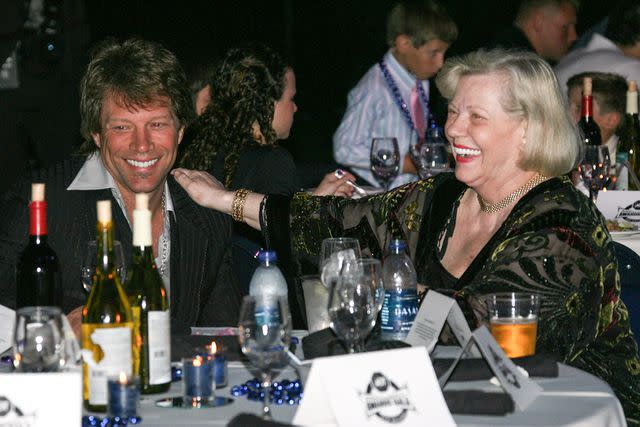 <p>Marc Serota/Getty</p> Jon Bon Jovi with his mother at an event in 2008