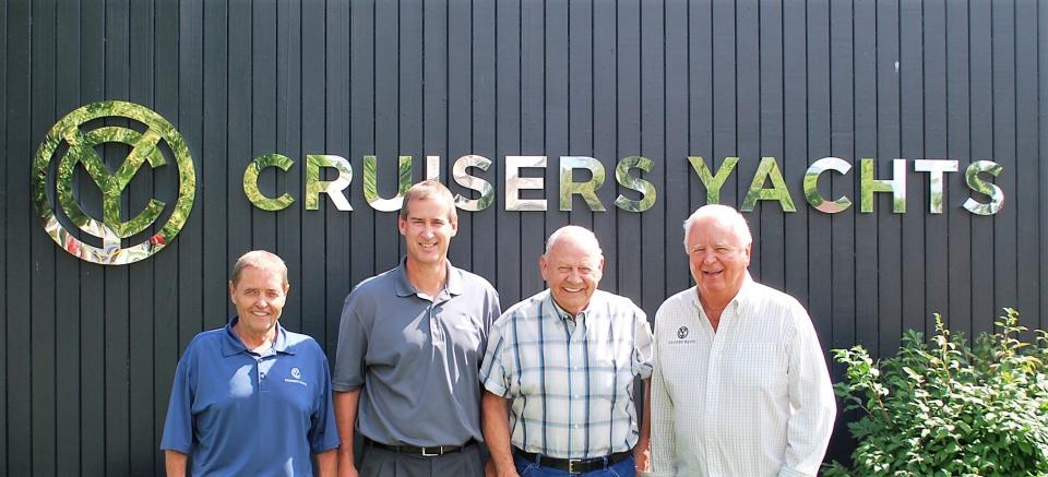 K.C. Stock poses for a photo at a retirement party for one of his employees at Cruisers Yachts, which he owned for many years.