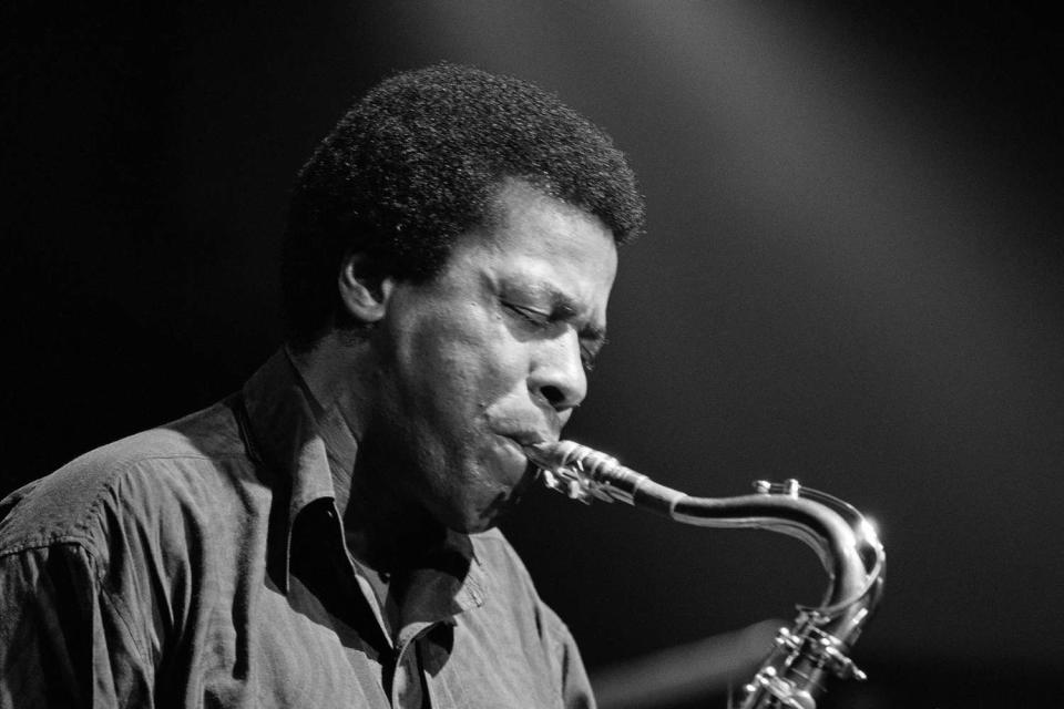 Wayne Shorter, US jazz saxophonist, playing the saxophone during a live concert performance at the Town & Country Club in Kentish Town, London, England, Great Britain, in April 1987.
