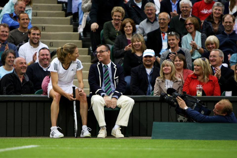 Steffi Graf stops for a chat with a line judge on Centre Court in 2009 (Getty Images)