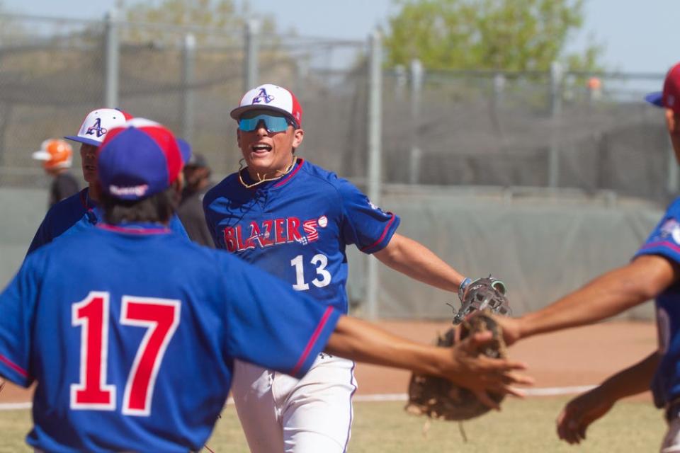 Americas High School's Easton Moomau celebrates with his teamates after getting the third out with bases loaded against Pebble Hills HIgh School on April 15, 2023