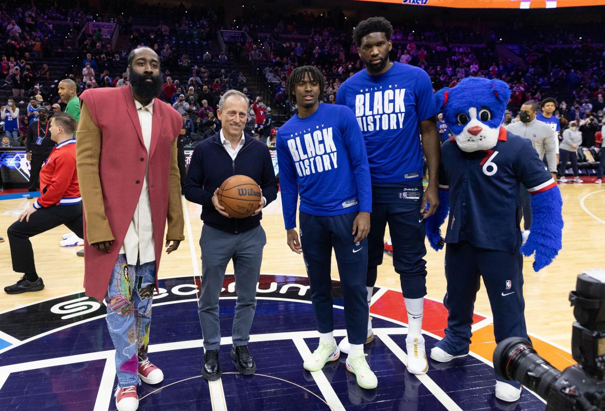 Feb 15, 2022; Philadelphia, Pennsylvania, USA; From left to right Philadelphia 76ers guard James Harden and owner Josh Harris and guard Tyrese Maxey (0) and center Joel Embiid (21) before before a game against the Boston Celtics at Wells Fargo Center. Mandatory Credit: Bill Streicher-USA TODAY Sports ORG XMIT: IMAGN-459683 ORIG FILE ID:  20220215_tbs_sq4_053.JPG