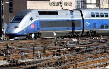 FILE PHOTO: A TGV train (high speed train) arrives at the French state-owned railway company SNCF station in Marseille, France, March 14, 2018. REUTERS/Jean-Paul Pelissier/File Photo