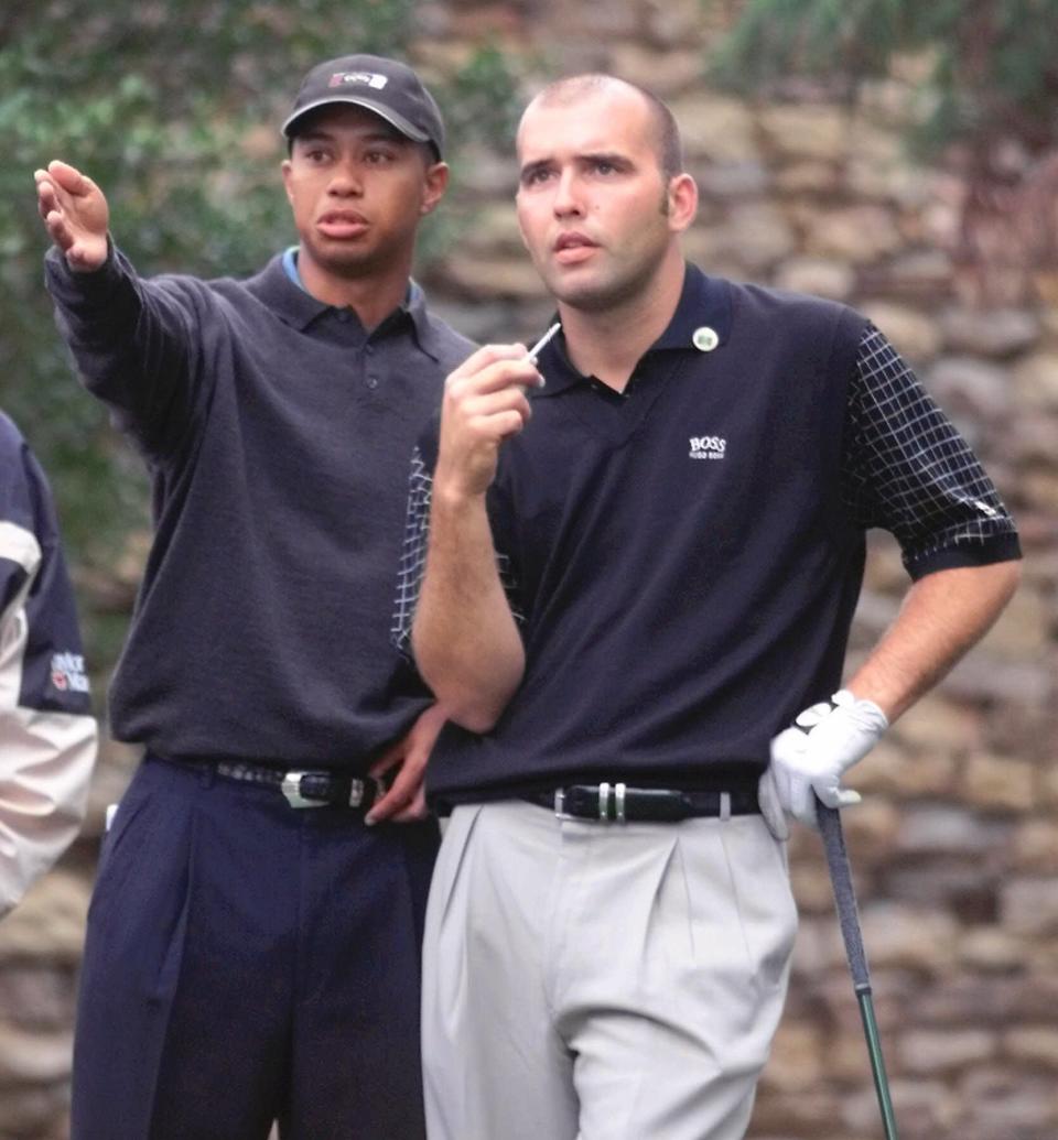 <p>1997 Masters Champion Tiger Woods, left, from Orlando, Fla., talks with U.S. Amateur Champion Hank Kuehne on the firts tee at the Augusta National Golf Club, in Augusta, Ga., Tuesday, April 6, 1999, during practice for the 1999 Masters. (AP Photo/Amy Sancetta) </p>