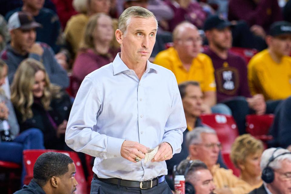 Nov 27, 2022; Tempe, Arizona, USA; Arizona State Sun Devils head coach Bobby Hurley unfolds his play card as his team plays the Alcorn State Braves at Desert Financial Arena in Tempe on Sunday, Nov. 27, 2022. Mandatory Credit: Alex Gould/The Republic