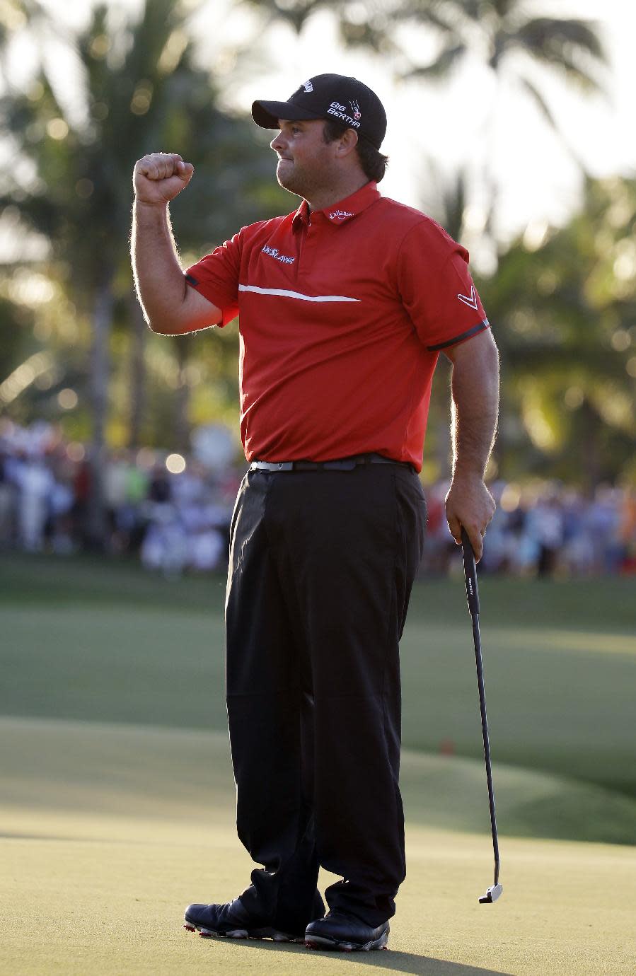 Patrick Reed celebrates his win at the Cadillac Championship golf tournament on Sunday, March 9, 2014, in Doral, Fla. (AP Photo/Lynne Sladky)