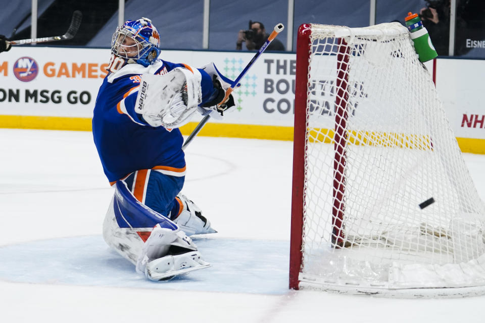 New York Islanders goaltender Ilya Sorokin (30) reacts to a shot on the goal during the first period of an NHL hockey game against the Philadelphia Flyers Thursday, April 8, 2021, in Uniondale, N.Y. (AP Photo/Frank Franklin II)