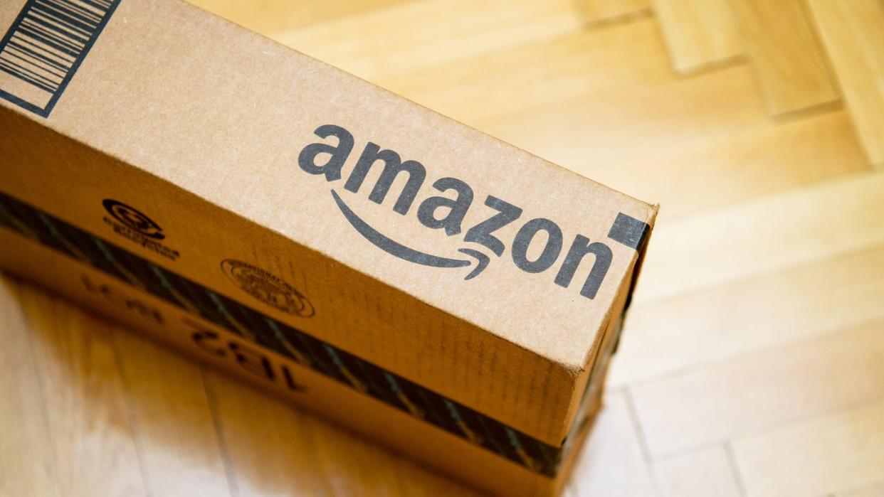 amazon logotype printed on cardboard box