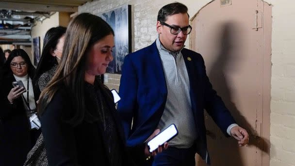 PHOTO: Rep. George Santos talks with reporters after attending a House GOP conference meeting on Capitol Hill in Washington, Jan. 10, 2023. (Patrick Semansky/AP)
