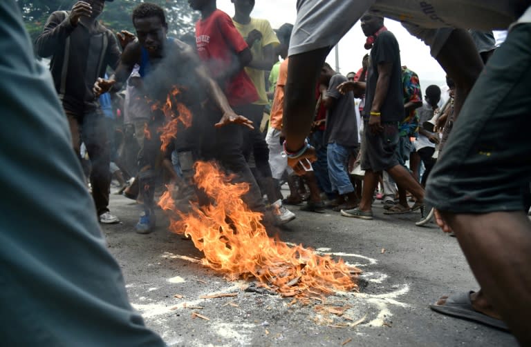 Several hundred protesters marched on Saturday in Port-au-Prince demanding the departure not just of Lafontant, but also of Moise