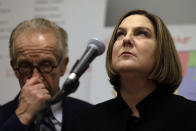 Cindy Yesko, right, pauses as she speaks during a news conference with attorney Jeff Anderson, Wednesday, March 20, 2019, in Chicago. Advocates for clergy abuse victims say their list of 395 priests or lay people in Illinois who have been publicly accused of sexually abusing children is far more extensive than the names already released by the state's six dioceses. (AP Photo/Kiichiro Sato)