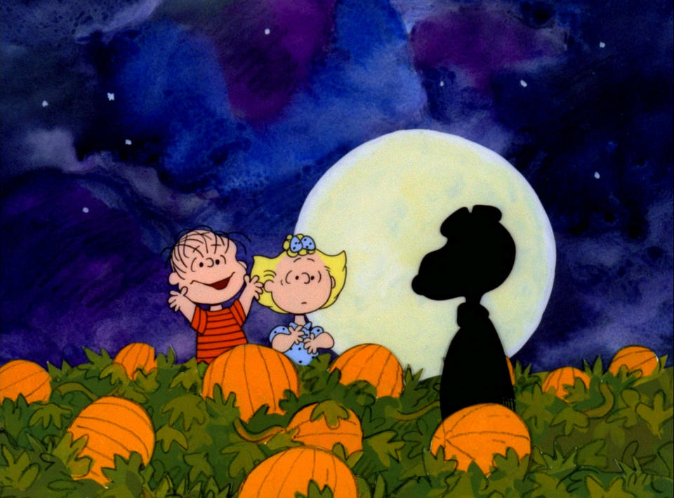 Linus and Lucy see Snoopy's silhouette in a pumpkin patch