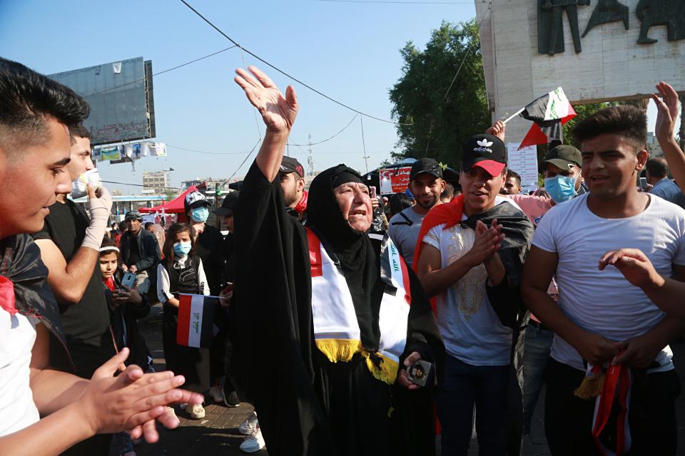 Anti-government protesters participate in ongoing demonstrations at Tahrir Square, in Baghdad, Iraq, Thursday, Oct. 31, 2019. (AP Photo/Hadi Mizban)