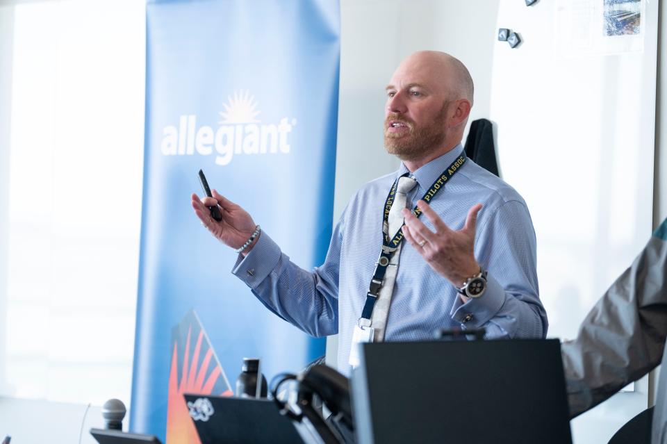 Allegiant representative Joshua Grzywa discusses the Accelerate Pilot Pathway program with aviation students at Western Michigan University's College of Aviation on Thursday, Nov. 2, 2023.