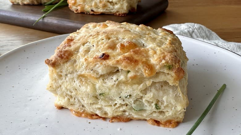 baked chive biscuit on plate