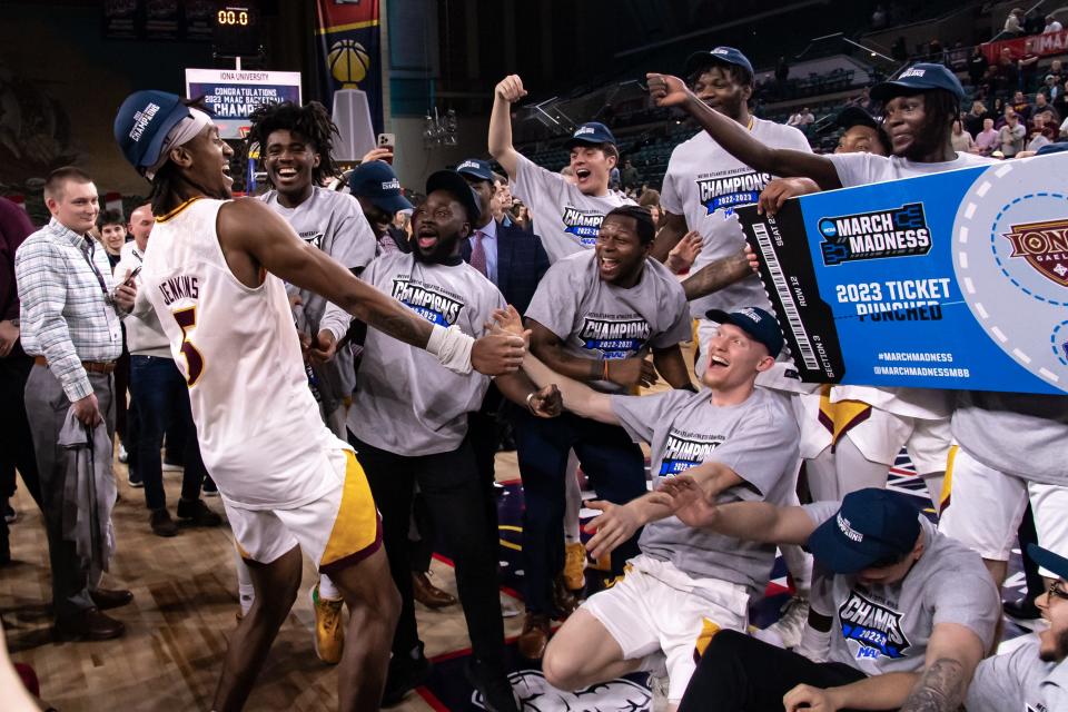 Mar 11, 2023; Atlantic City, NJ, USA; Iona Gaels players celebrate after winning the MAAC Conference final against the Marist Red Foxes at Jim Whelan Boardwalk Hall. Mandatory Credit: John Jones-USA TODAY Sports